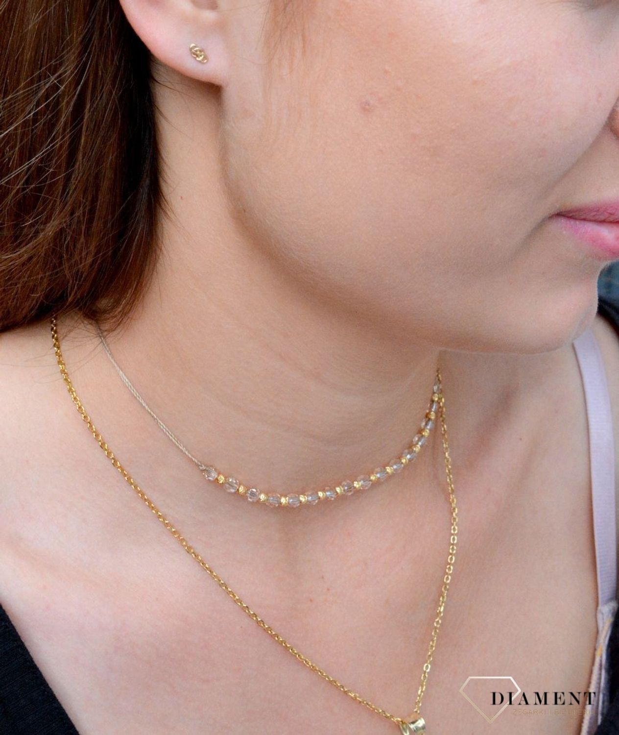 Złote kolczyki w kształcie serca łączone z nieskończonością KL 9928 333. Eleganckie kolczyki złote. Zdobione złote kolczyki. Kolczyki złote serca. Kolczyki w kolorze złotym. Kolczyki złote dla kobiet.jpg